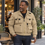 Adult man wearing the khaki Phantom jacket during a relaxed café conversation.