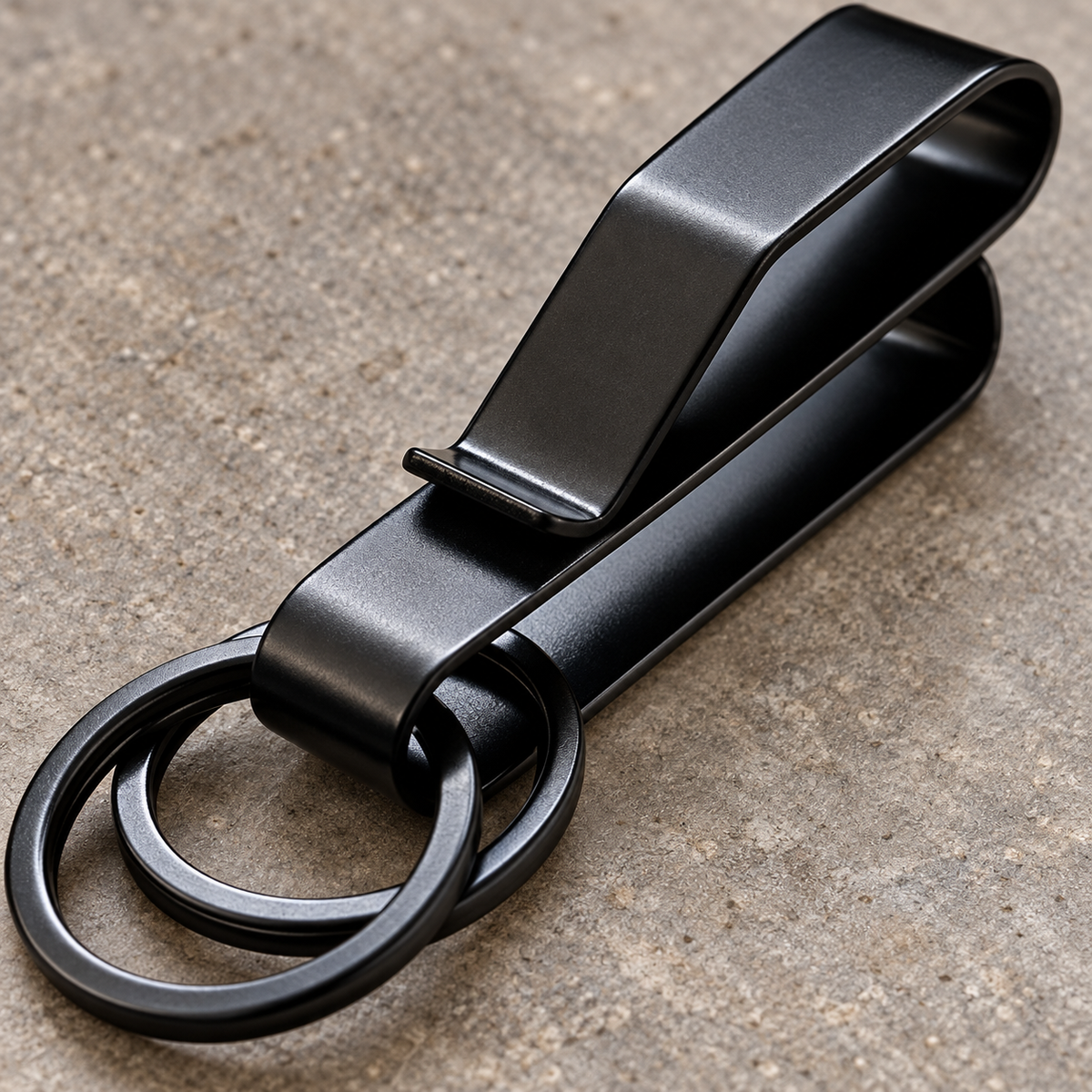 Close view of the open belt channel in the black Phantom spring clip.