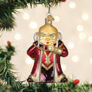 Adorno Dungeon Master junto a ramas de árbol de Navidad