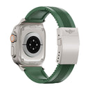 Vista posterior del Apple Watch con correa verde y broche plegable