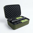 IRONCLAD X1 XL kit de linterna con cuatro baterías y cable en un estuche de transporte verde abierto sobre fondo blanco