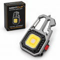 Luz de trabajo tipo llavero gris NightClip con caja premium sobre fondo blanco