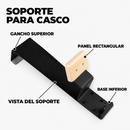 Soporte negro para casco con gancho superior, panel rectangular y base, con rótulos de sus partes en español.