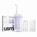 Irrigador bucal usmile C10 lila con boquillas, estuche y caja sobre fondo blanco.